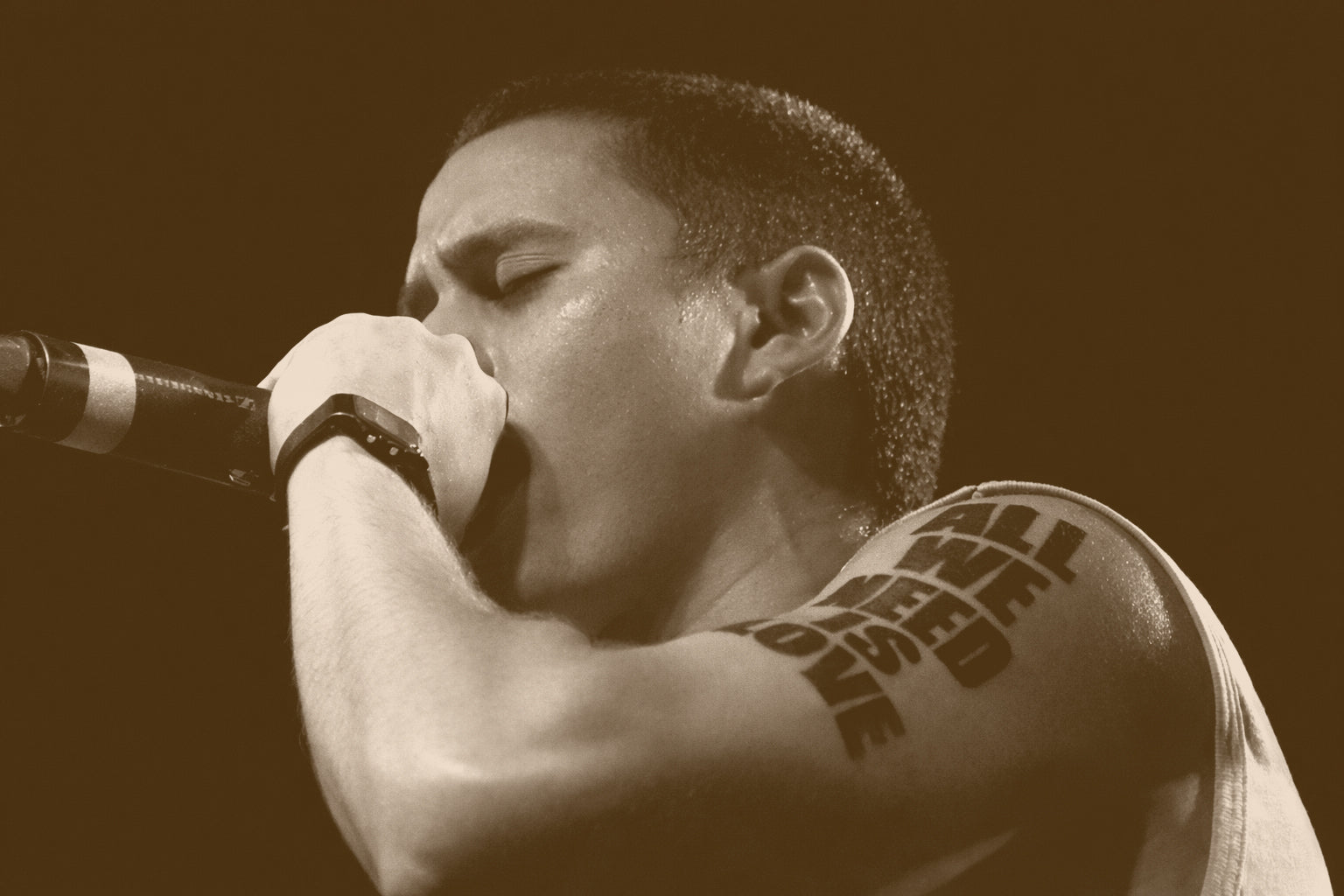 Canserbero performing live — VEZLA Canserbero clothing collection, Venezuelan rap legend merch and tribute streetwear

