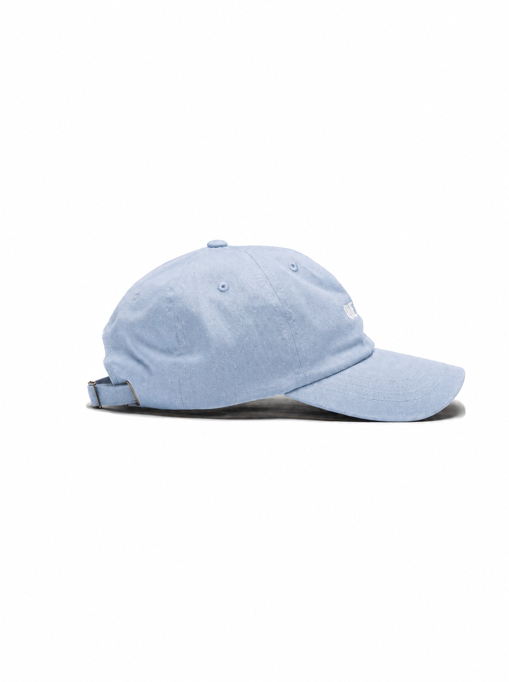 “Que Lacreo” embroidered light blue dad hat — Venezuelan slang streetwear, side view #color_light_blue