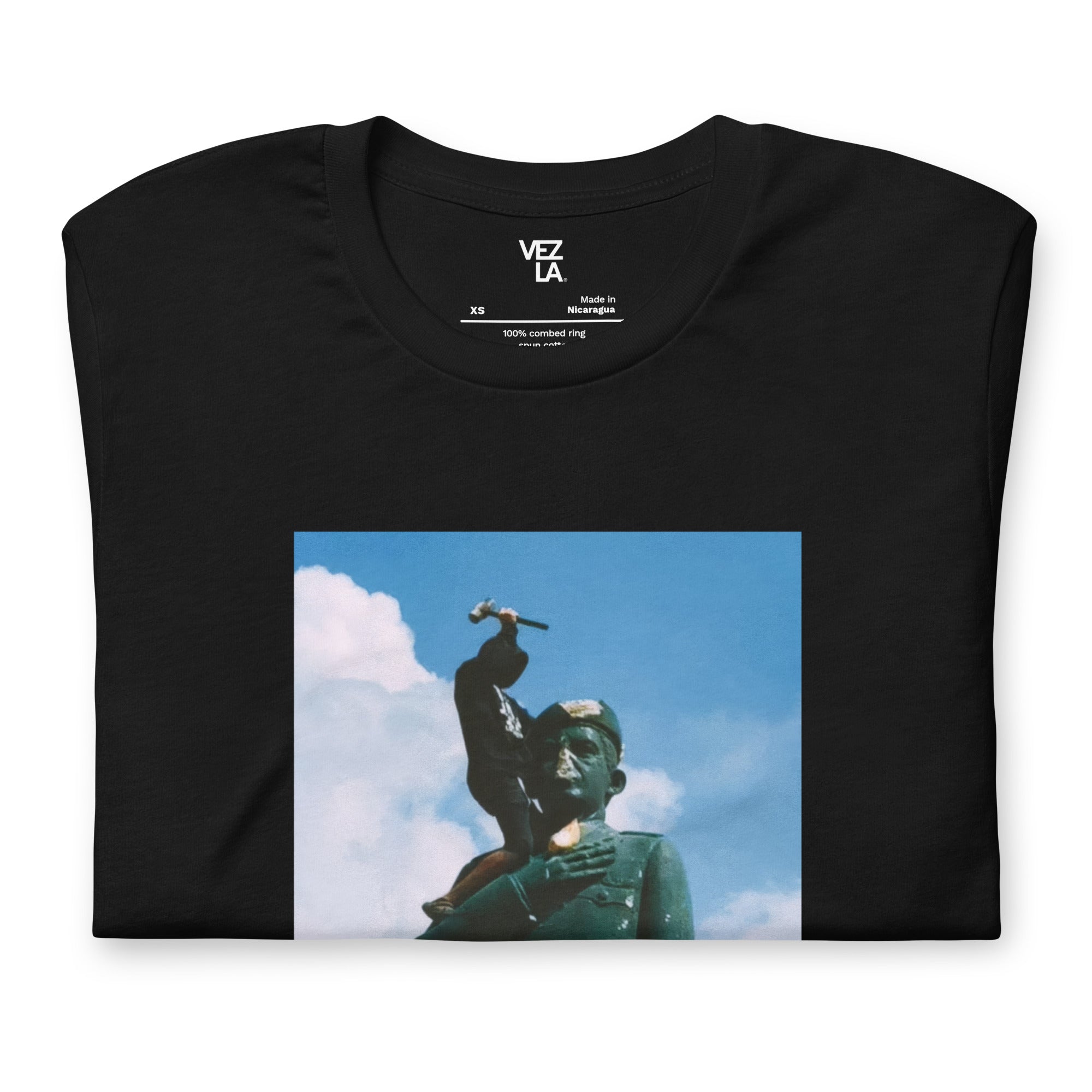 “F*ck Dictators” Chávez statue t-shirt in black, folded detail — Venezuelan political humor #color_black