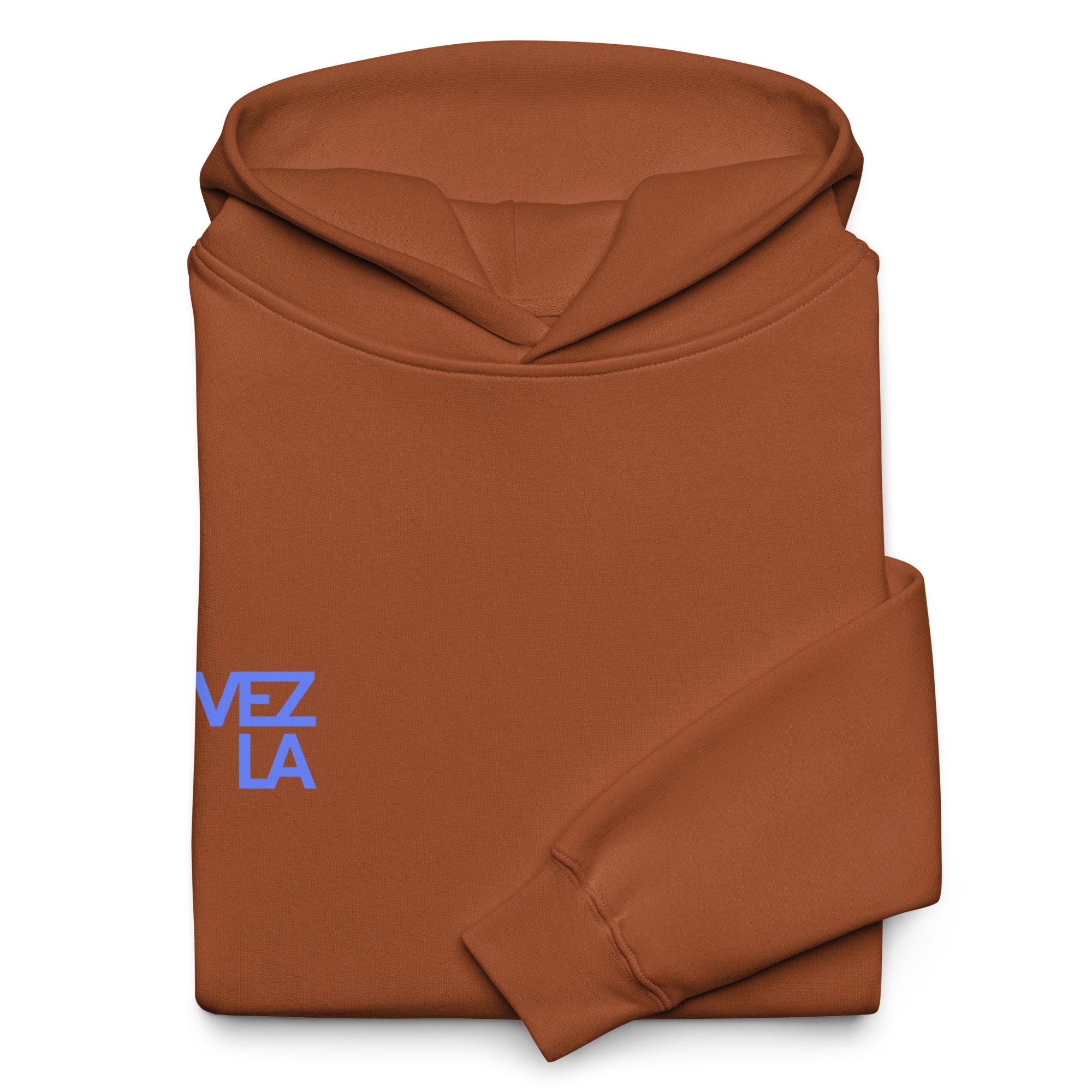 Statue of Liberty holding Polar beer oversized hoodie in clay, folded detail — Venezuelan American #color_clay