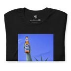 Statue of Liberty holding Polar beer t-shirt in black, folded detail — Venezuelan American #color_black