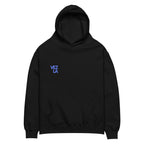 Statue of Liberty holding Polar beer oversized hoodie in black, back view — Venezuelan American #color_black