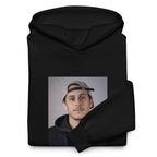 Canserbero portrait hoodie in black, folded detail — Canserbero merch #color_black