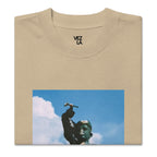 “F*ck Dictators” Chávez statue oversized faded tee in faded khaki, folded detail — Venezuelan political humor #color_faded_khaki