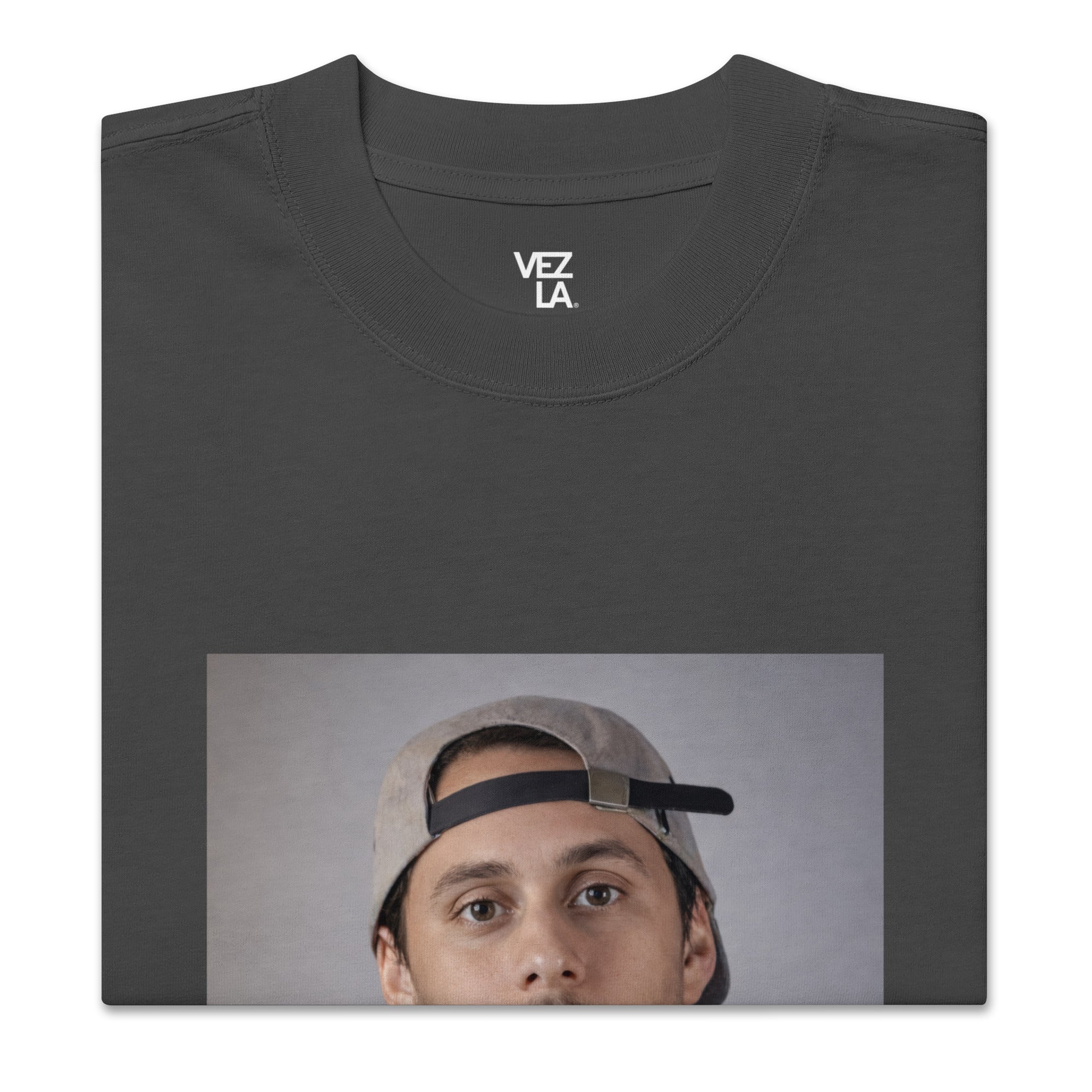 Canserbero portrait oversized faded tee in faded black, folded detail — Canserbero merch #color_faded_black