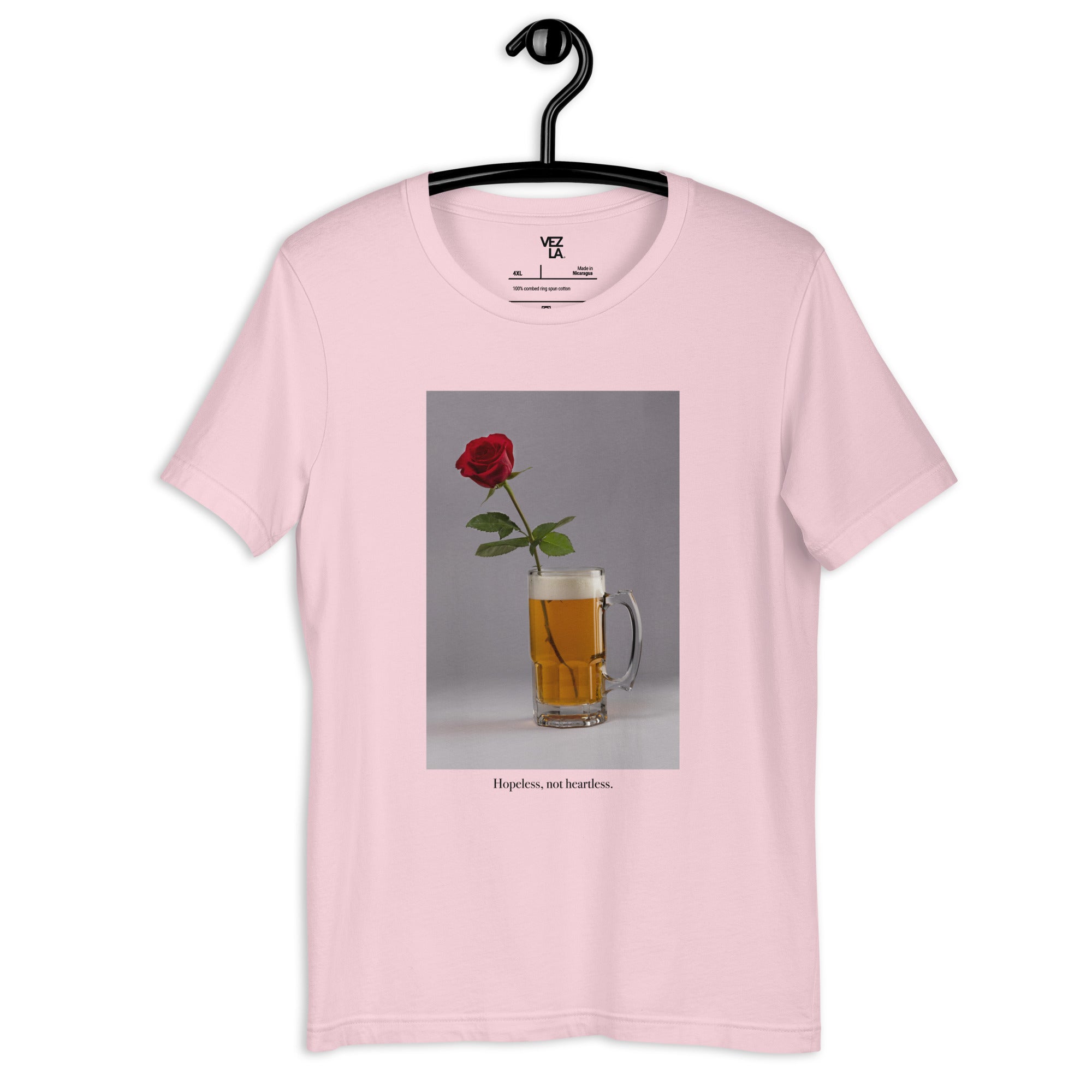 “Hopeless, not heartless” t-shirt in soft pink, front view — Venezuelan streetwear #color_soft_pink