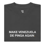“Make Venezuela De Pinga Again” oversized faded tee in faded black, folded detail — Venezuelan political humor #color_faded_black