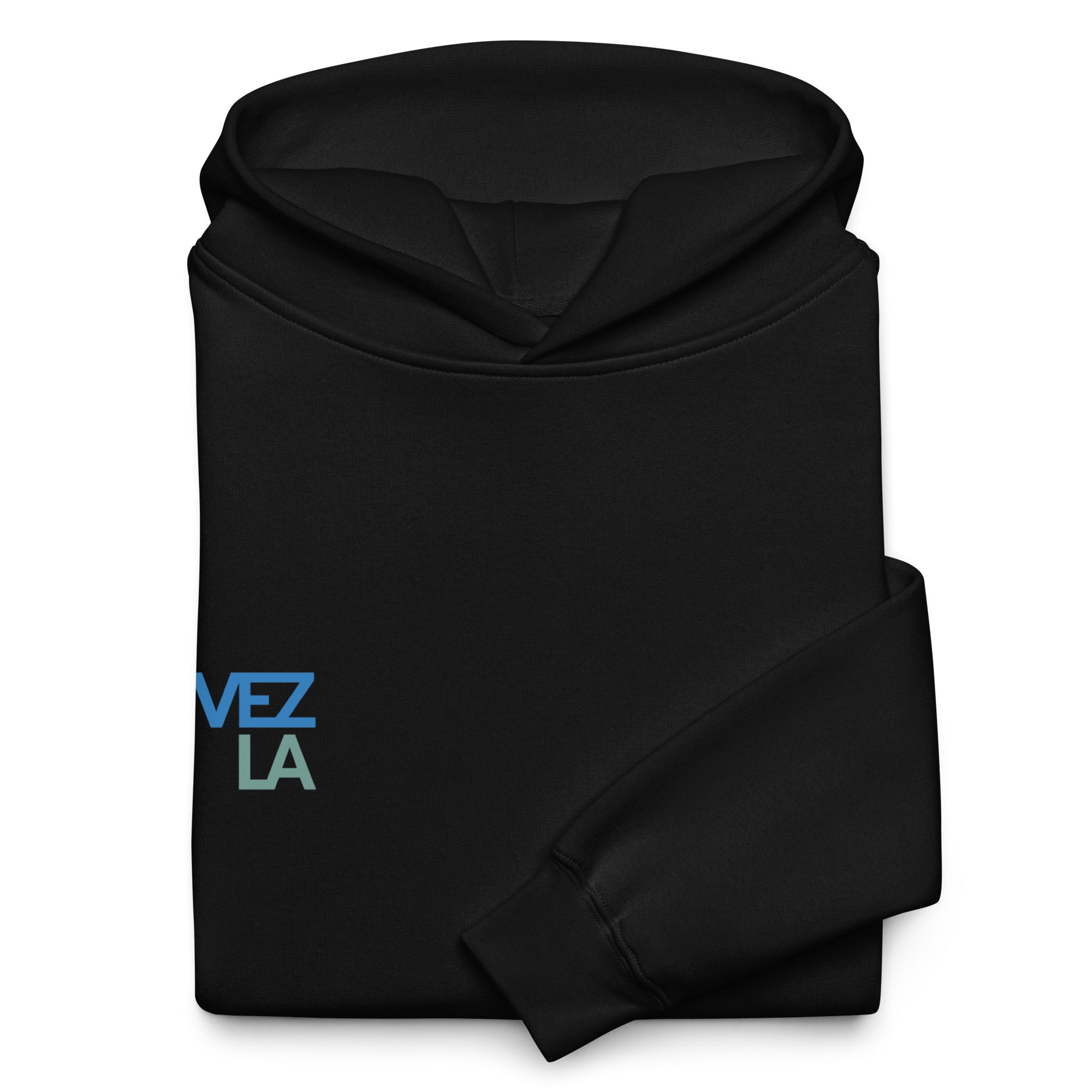 Statue of Liberty holding Zulia beer oversized hoodie in black, folded detail — Venezuelan American #color_black