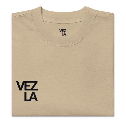 Canserbero “All We Need Is Love” oversized faded tee in faded khaki, folded detail — Canserbero merch #color_faded_khaki