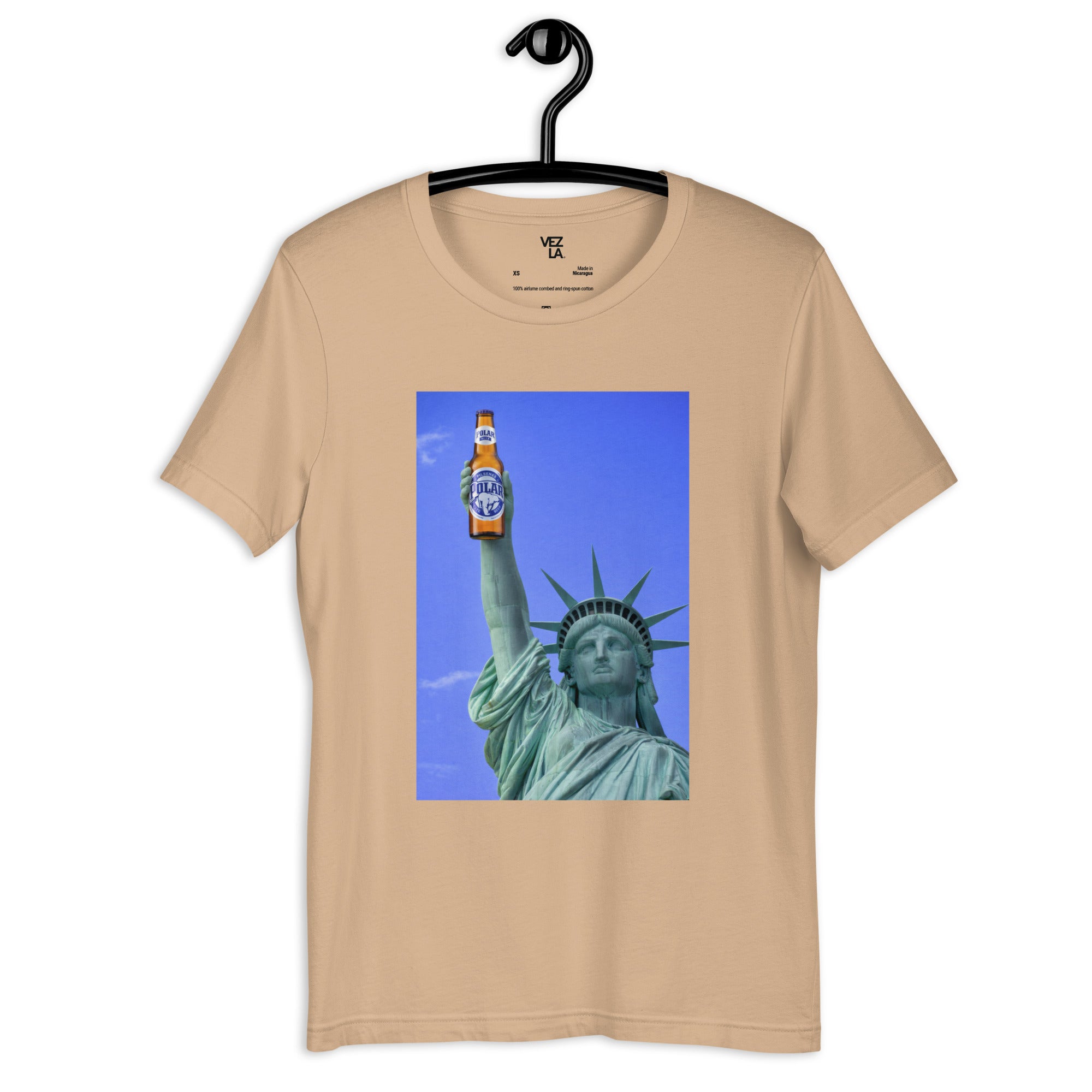 Statue of Liberty holding Polar beer t-shirt in tan, front view — Venezuelan American #color_tan
